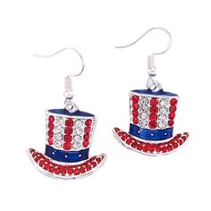 A perfect patriotic accessory with any outfit! These American flag top hat earrings are silver with beautiful red, clear and blue rhinestones and enamel accents. Each earring is approximately 20mm x 22mm and dangles charmingly from a fish hook ear wire. Patriotic Earrings For 4th Of July, Patriotic 4th Of July Earrings, Patriotic Adjustable Dangle Jewelry, Nickel Free Dangle Jewelry For 4th Of July, Silver Jewelry For 4th Of July Gift, Silver Jewelry Gift For 4th Of July, Patriotic Dangle Earrings For Independence Day, Adjustable Red Patriotic Earrings, Patriotic Drop Earrings For 4th Of July