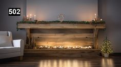 a living room filled with furniture and a fire place next to a wall mounted christmas tree