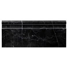 a black and white marble shelf on a white background