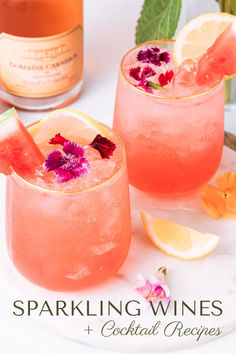 two glasses filled with pink lemonade and watermelon garnish next to a bottle of sparkling wines