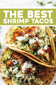 the best shrimp tacos with avocado and cilantro sauce on top