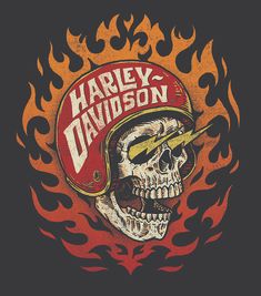 a skull wearing a helmet with flames around it and the words harley davidson on it