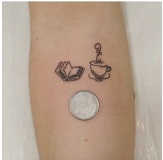 a small tattoo on the arm of a person with a coffee cup and teacup