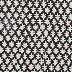 a black and white pattern with leaves on it