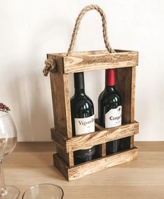 two bottles of wine in a wooden crate