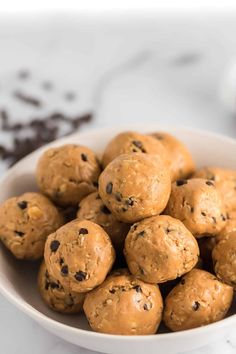 a white bowl filled with chocolate chip energy bites