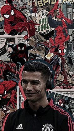 a man wearing headphones standing in front of a wall covered with spiderman posters