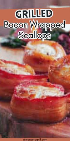 grilled bacon wrapped scallops on a cutting board with text overlay that reads grilled bacon wrapped scallops