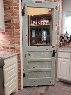 an old door is opened to reveal a pantry