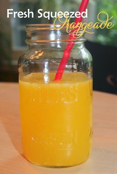 a mason jar filled with fresh squeezed mango juice