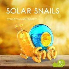 an advertisement for solar snails, with gold and blue items in the foreground