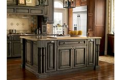 a large kitchen island sitting in the middle of a living room