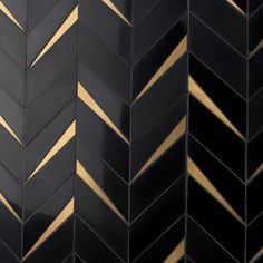 black and gold chevron tiles with metallic lines