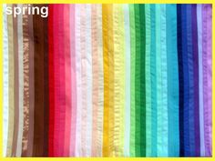 an image of a rainbow colored background with the words spring written in white on it