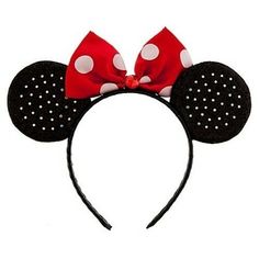 a minnie mouse ears headband with polka dots and a red bow on it's side