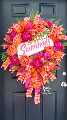 an orange and pink wreath with the words summer on it