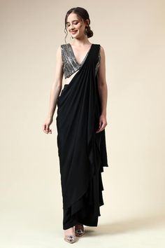 Black pre-draped saree with cascading center. Paired with a black and grey blouse with sequins, cutdana embroidery. - Aza Fashions Festive Gala Pre-draped Saree, Side Open Pre-draped Saree For Diwali Party, Sleeveless Saree For Diwali Evening, Glamorous Draped Georgette Saree, Georgette Pre-draped Saree For Gala, Bollywood Style Side Open Pre-draped Saree For Evening, Sleeveless Georgette Pre-draped Saree For Party, Diwali Party Wear Pre-draped Saree, Sleeveless Party Wear Pre-draped Georgette Saree