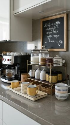 the coffee bar is stocked with cups and saucers, along with other breakfast foods