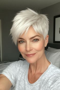 Click for More ➡️ | Save for Later ❤️A crisp, pearl white color combined with a cropped pixie cut creates an elegant and polished look, perfect for highlighting a minimalist aesthetic. (Pearl White Short Crop - Short Pixie Haircuts For Older Women)