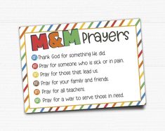 a sign with the words m & m prayers written in colorful letters on it