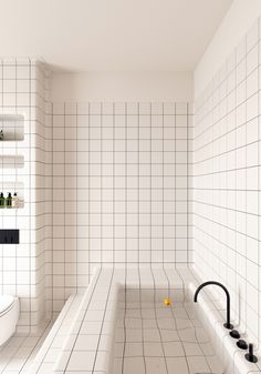 a white tiled bathroom with a black faucet next to the bathtub and sink