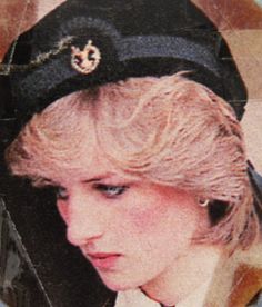 a woman with blonde hair wearing a hat