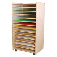 a wooden shelf with many files and folders