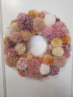 a close up of a wreath on a door