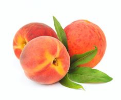 three peaches with leaves on white background