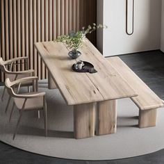 a large wooden table sitting in the middle of a room