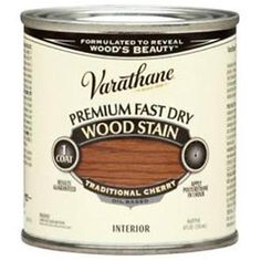 a can of wood stain on a white background