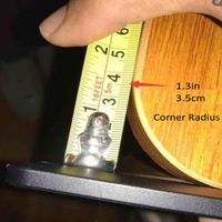 the measuring tape is being used to measure wood