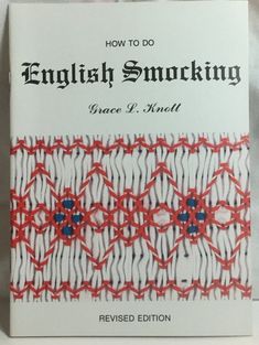 a book with red and white crochet on it's cover that says, how to do english smocking