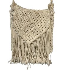 Color: Cream Pattern: Crochet Theme: Bohemian Crossbody Shoulder Bag Measurements: 13 inches Length (33.02 cm) x 9.5 inches Width (24.13 cm) x 16 inches Drop (40.64 cm). Condition: PreOwned; No rips, tears or frayed areas. Cream purse does have some staining from use/storage. May come out but did not want to chance. Shoulder Bag Pattern, Bag Pattern Crochet, Cream Purse, Bohemian Crochet, Crochet Fringe, Crochet Clothing And Accessories, Crochet Clothing, Movie Props, Purses Designer