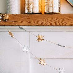 Sparkle Palm Star Garland - Ten Thousand Villages Folded Stars, Ribbon Star, Candle Wall Decor, Patio Planters, Metal Star, Sustainable Kitchen, Star Garland, Metal Stars, Cotton String