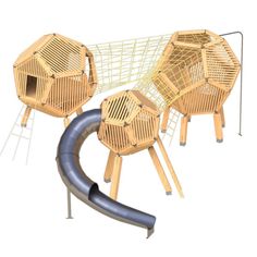 the wooden structure is connected to a metal pipe and has two small round structures on it