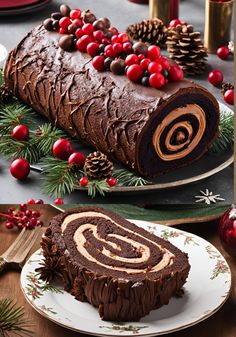 there is a chocolate roll on the plate with christmas decorations around it and other holiday foods