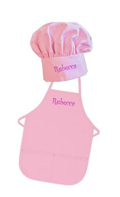 a pink apron and hat with the words reebocce on it's side