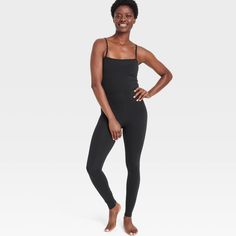 Why we're ALL IN: This sleeveless bodysuit is designed to keep you looking and feeling your best during active days. Made from moisture-wicking nylon fabric with spandex for a stretchy fit that moves with you. Features adjustable straps and flat seams for customizable and comfortable wear. Ankle length offers coverage for a range of activities. All in Motion™: Inspiring the potential in every body. Active Bodysuit, Tank Jumpsuit, All In Motion, Racerback Sports Bra, Sleeveless Bodysuit, High Rise Leggings, Hem Style, Nylon Fabric, Pair Of Pants