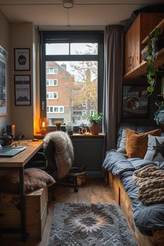 a bedroom with a window, desk and bed in it's corner area next to a large window