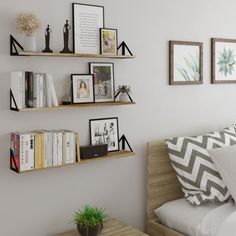 a bed room with a neatly made bed and shelves