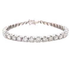 18kt white gold round brilliant diamond tennis bracelet, perfect for layering or wearing alone! This tennis bracelet has double figure 8 catches for peace of mind! Please contact us for custom sizes, qualities and layouts. Colour E-F-G Clarity SI2 - I1 Carat 5.77ct Diamond Tennis Bracelet, Figure 8, Tennis Bracelet Diamond, Brilliant Diamond, Tennis Bracelet, Round Brilliant, Layering, Tennis, White Gold