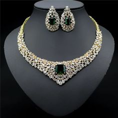 Green Hand Set Jewelry For Marriage, Green Hand-set Jewelry For Marriage, Green Crystal Jewelry With Matching Earrings, Emerald Jewelry With Matching Earrings For Wedding, Gold Emerald Jewelry Sets For Party, Emerald Jewelry Set For Wedding, Green Emerald Jewelry For Marriage, Emerald Green Jewelry For Marriage, Green Cubic Zirconia Jewelry Sets With Matching Earrings