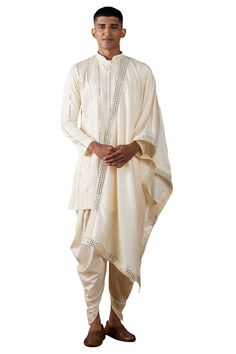 Product Features: Top Color: Cream Top Fabric: Viscose Pattern: Embellished,Embroidered,Zig Zac Sleeve: Full Sleeve-Regular Collar: Mandarin/Chinese Neck Closure: Button Shape: Straight-Regular Wash: Dry Clean preferably or cold light wash Occasion: Casual,Formal,Party,Festive,Wedding Product: Men's Kurta Dhoti Disclaimer: There will be slight difference in digital to actual image Cotton Sherwani With Gota Work For Wedding, Diwali Cotton Sherwani With Dupatta, Navratri Cotton Silk Sherwani With Dupatta, Traditional Cotton Sherwani With Dupatta, Cotton Sherwani With Dupatta For Festivals, Men Dhoti Kurta Indian Weddings, Dhoti With Kurta For Men, Bengali Dhoti Men, White Dhoti Kurta For Men