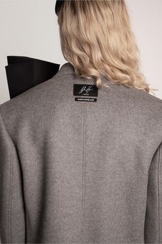 OVER-SIZED WOOL-BLEND DB JACKET WITH ASYMMETRIC PLEATED FRONTIntroducing the Oversized Wool-Blend DB Jacket with Asymmetric Pleated Front. This extraordinary blazer suit showcases a unique combination of style and comfort. Crafted from a luxurious blend of 95% Virgin Wool and 5% Cashmere, it offers warmth and a soft touch. The dusty grey colour adds a sophisticated allure to the ensemble. The oversized fit and asymmetrical pleated front create a modern and dynamic look.SIZE & FIT It True To Size Oversized Wool Blazer For Fall, Modern Wool Blazer For Fall, Pleated Jacket, Cashmere Color, Grey Colour, Bespoke Design, Blazer Suit, Gray Color, Wool Blend