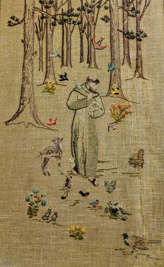 an image of a man in the woods with birds and flowers on it's back