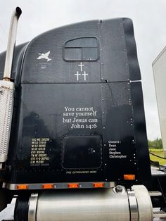 the back of a semi truck with a message written on it