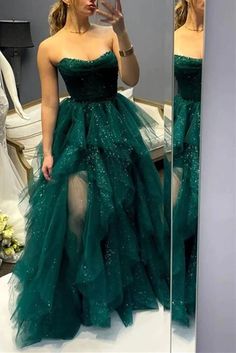 This formal prom dress features a glitter tulle A-line design with a strapless empire waist for a flattering and elegant look. Expertly crafted with high-quality materials, this dress exudes sophistication and style. Perfect for any formal occasion, this dress will make you feel confident and glamorous.