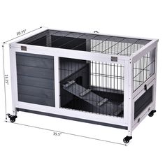 the large dog cage is on wheels and has an opening for it's door