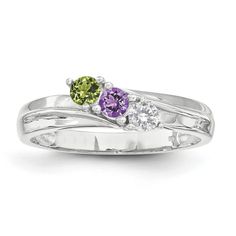 three stone ring set in white gold with amethyst and peridolites